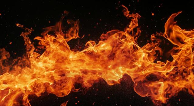 Vibrant Flames Create Mesmerizing Patterns Against a Dark Background During a Nighttime Fire Display photo