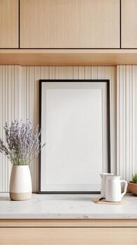 Modern Kitchen Display With Empty Frame, Cutting Board, and Fresh Lavender in White Pitcher. photo