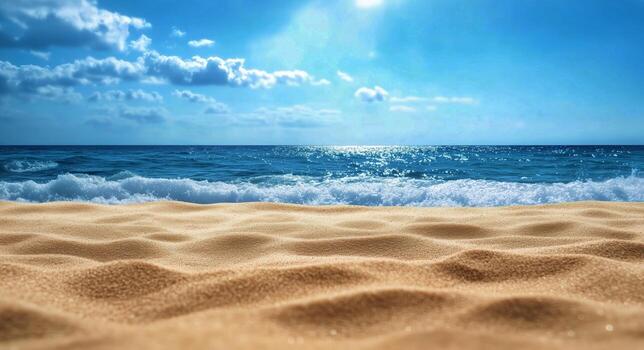 Soft Golden Sand on a Beach With Waves and Blue Sky During a Sunny Day. photo