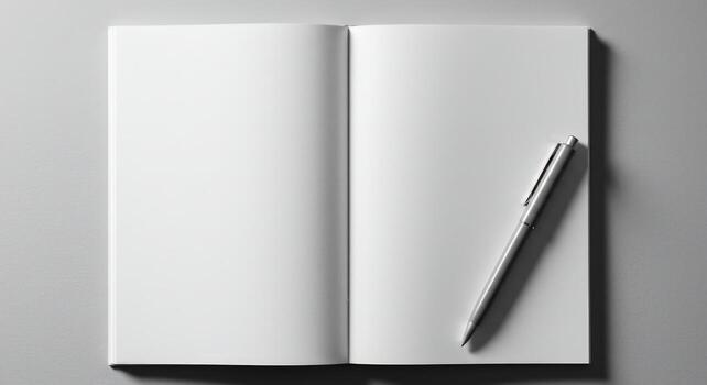 Open notebook with blank pages and pen mockup top view photo