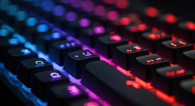 Illuminated computer keyboard close up electronic device photo