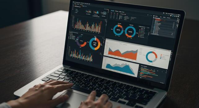 Laptop displaying financial data analysis and graph visualizations photo
