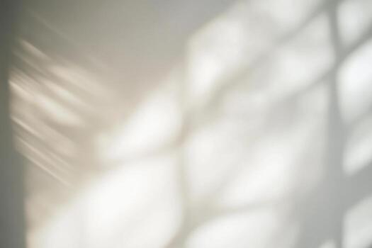 A white wall with a window in the background photo