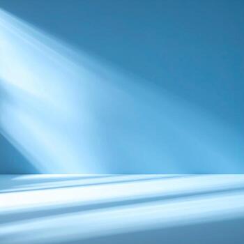 Light rays illuminating a pale blue room photo
