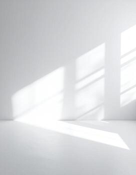 White room with light coming through the windows photo