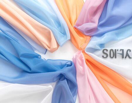 Colorful flowing fabrics arranged in a circle photo