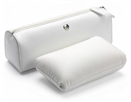 Two white leather cases, one cylindrical, one rectangular photo