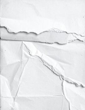 Crumpled, torn white paper texture photo