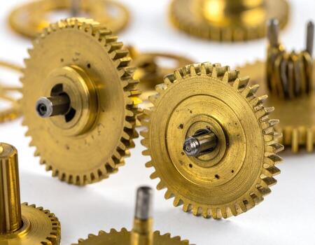 Close-up of brass clock gears photo