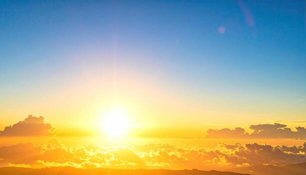 Sunrise over a hazy, golden sky photo