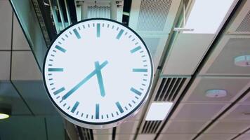 Minimalist Wall Clock Displaying Modern Time in Urban Setting video