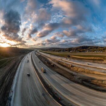 A 360 - view of a highway at sunset photo