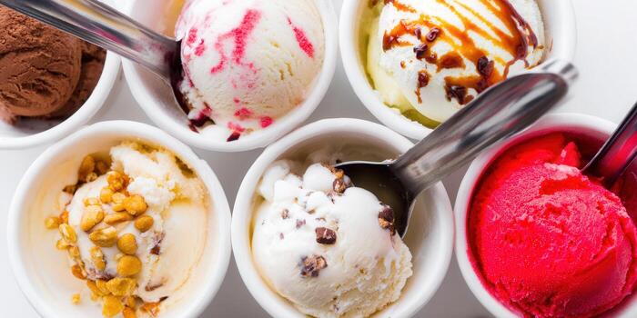 A vibrant display of ice cream scoops in various delicious flavors ready to enjoy. photo
