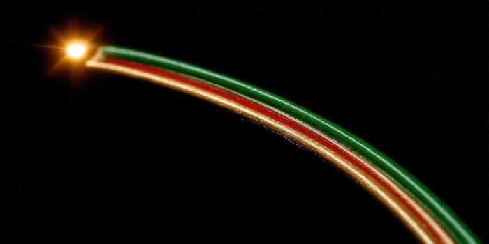 A glowing arc of color and light creates an abstract and radiant visual. photo