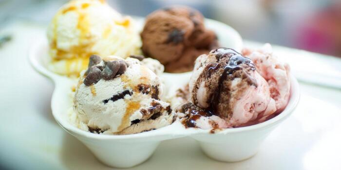 Indulge in a delicious ice cream selection, with various flavors and toppings. photo