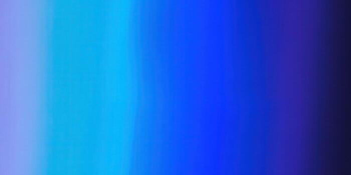 A stunning blue and purple gradient creates a vibrant, abstract background. photo