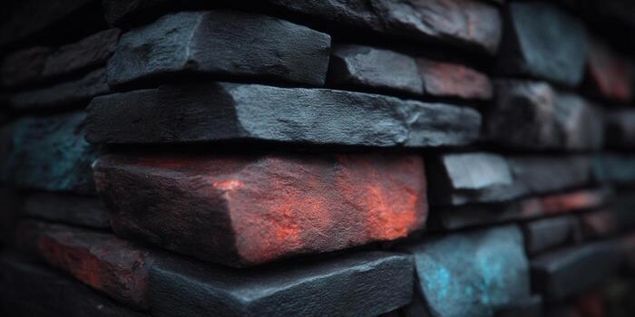 A stunning close-up view of a stone wall with various colors and textures. photo