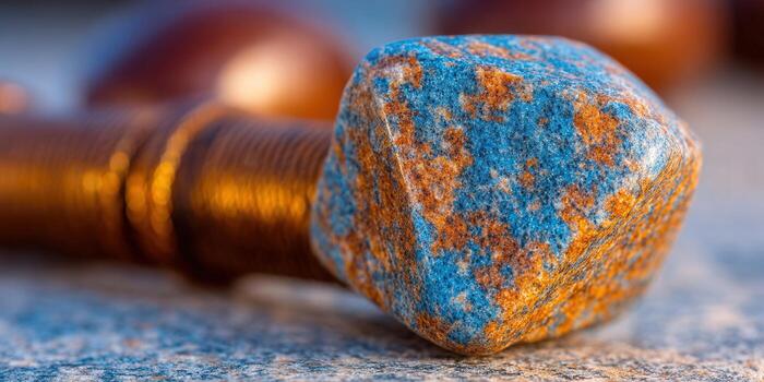 Close-up of a blue and orange mineral stone with a textured surface photo