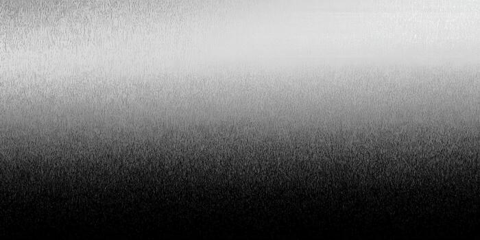 A textured gradient background with a transition from light to dark grayscale shades. photo
