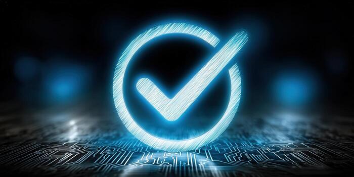 A vibrant blue check mark glows on a digital circuit board, representing success. photo