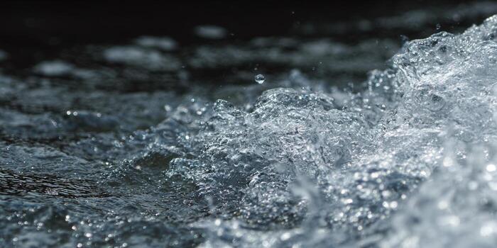 The image showcases the captivating dance of water, emphasizing its fluidity and clarity. photo