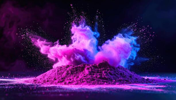 Vibrant pink and blue powder explodes in a dramatic display of color photo