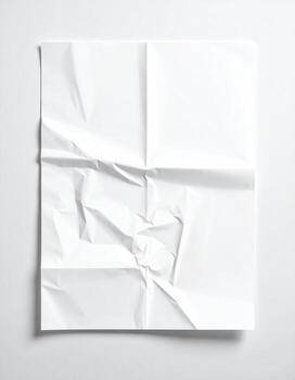 Folded, wrinkled white paper on a white background photo