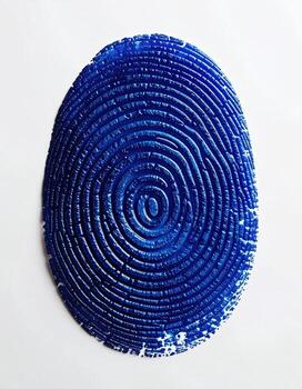 Oval, deep-blue, textured, circular design photo