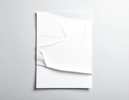 Crumpled white paper sheet, top-down view photo