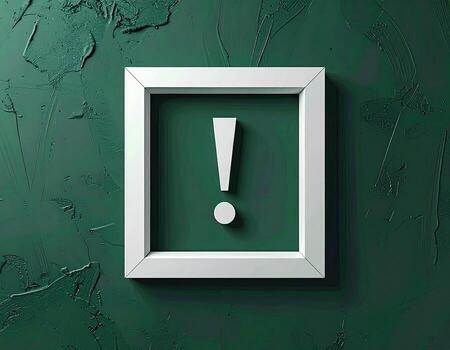 White frame with exclamation point on teal-green textured wall photo