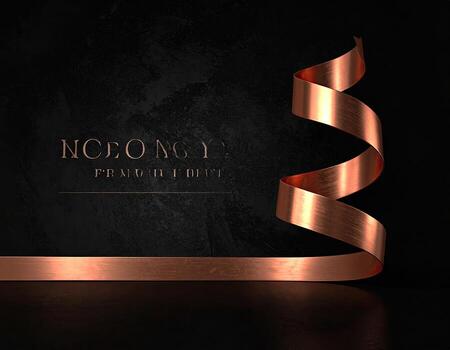 Copper ribbon on dark textured background photo