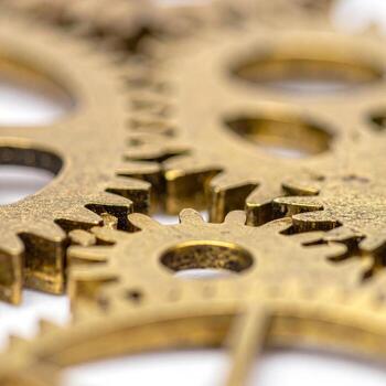Close-up of intricate brass gears photo
