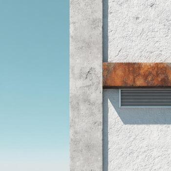 A wall with a window and a vent on it photo