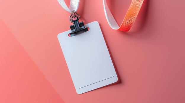 A white id card with a lanyard attached to it photo