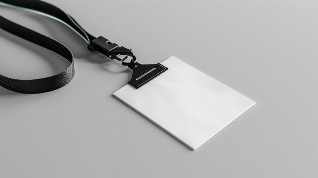 A blank white card with a lanyard attached to it photo