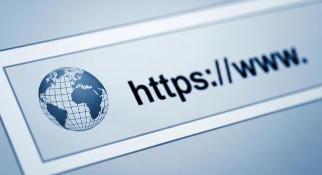 Close up of https www address bar with globe icon for internet browsing and website access concept photo