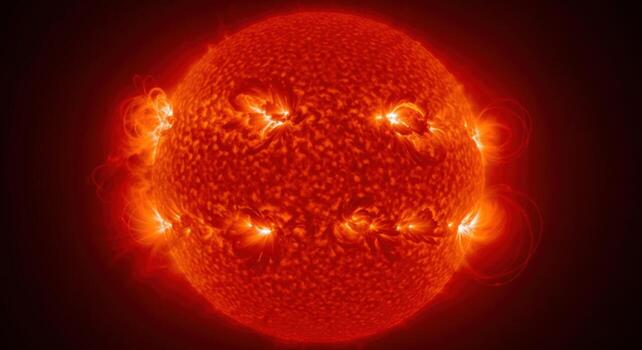 Close up view of the surface of the sun with solar flares and prominences in a dark space setting photo