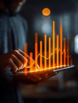 Business analytics and data visualization on digital tablet photo