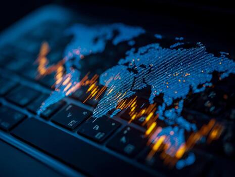 Digital world map with data visualization on a keyboard background photo
