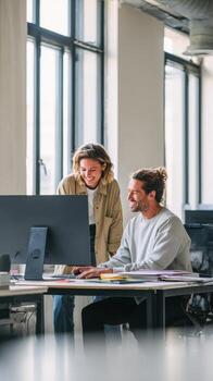 Bright modern office setting with project manager collaborating on tasks at workstation photo