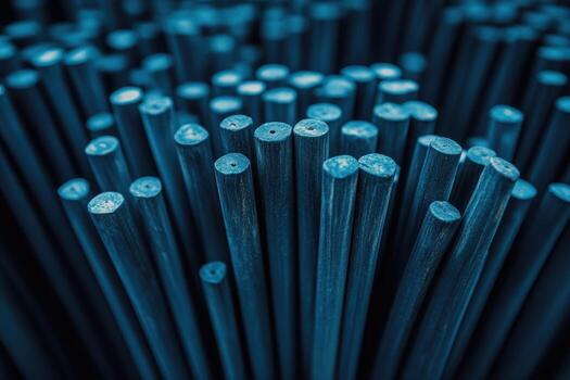 Close-up view of multiple blue metal rods arranged in a pattern photo