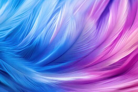 Vibrant swirl of blue and pink feathers creating a colorful abstract pattern photo
