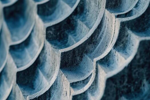 Textured pattern of sculpted curves on a concrete surface photo