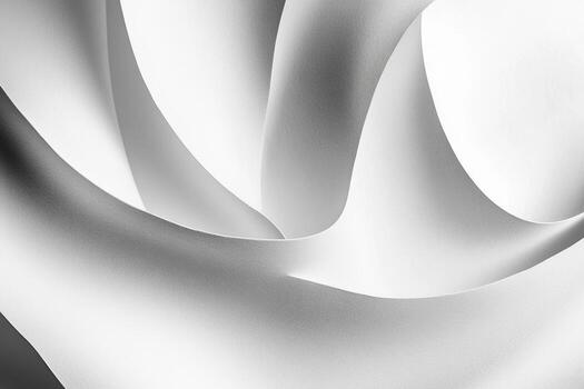 Elegant white fabric gracefully folds in soft curves and swirls photo