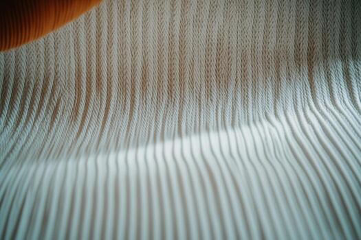 Texture of a soft fabric illuminated by gentle light from above photo