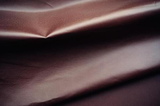 Rich brown fabric draped elegantly for design and craft projects photo