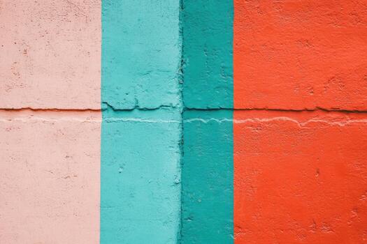 Vibrant colors divided by lines create an artistic wall in an urban setting photo