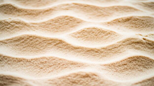 Detailed view of wavy sand patterns collected on a sunny beach shore photo
