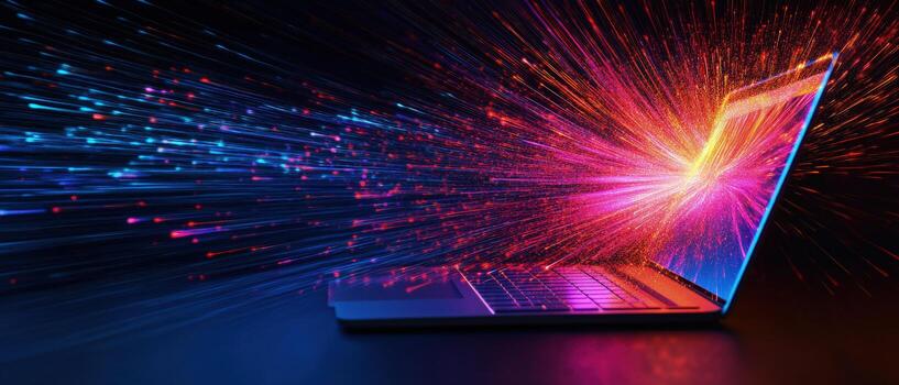 Glowing rays emanate from a laptop screen on dark background creating vibrant digital stream photo