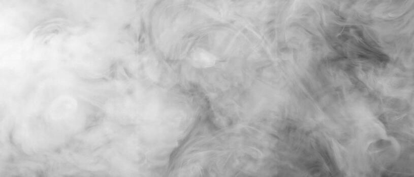 Abstract background of swirling white smoke or fog in soft cloudy patterns. photo